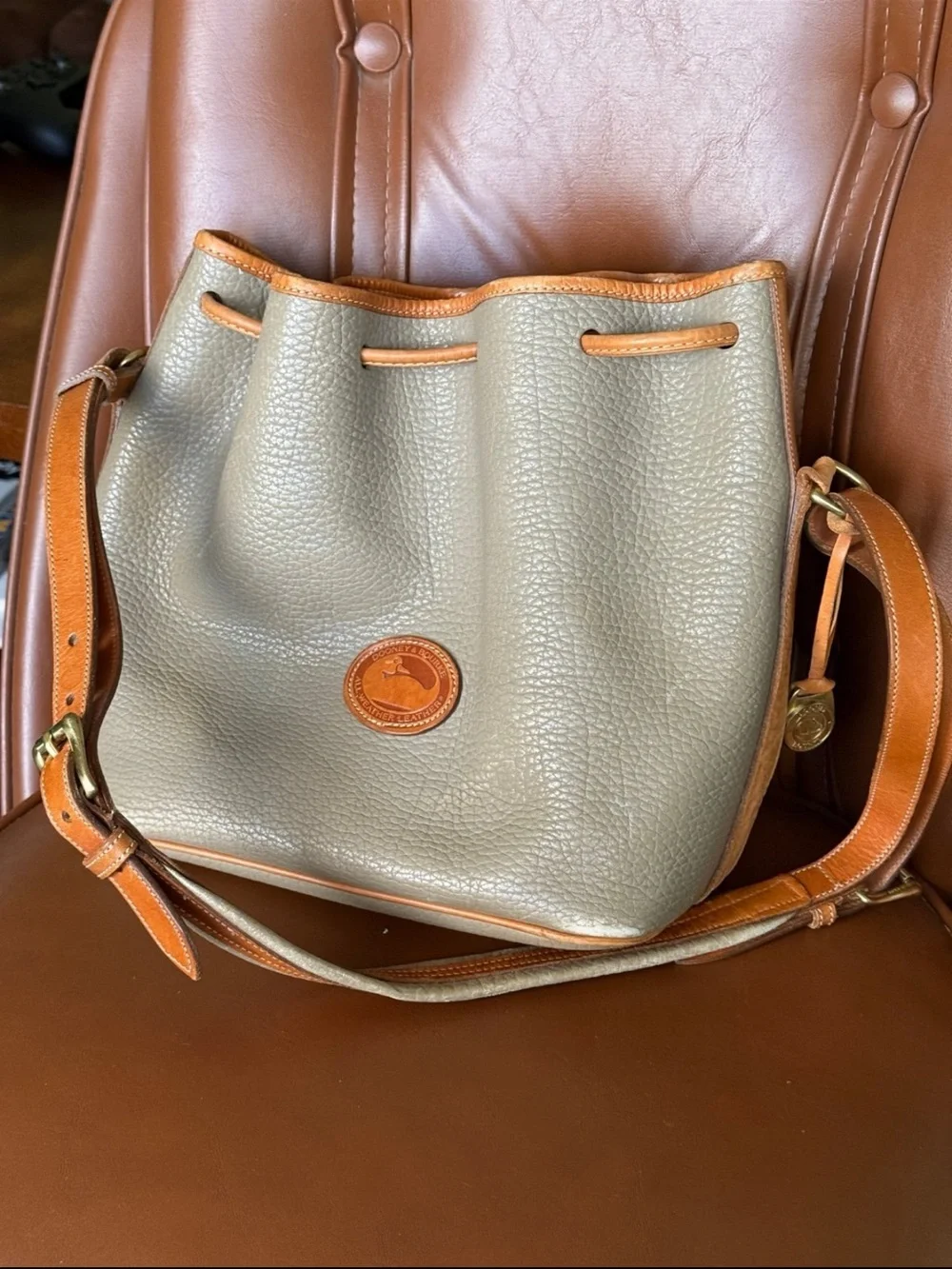 Dooney & Bourke Olive Pebble Leather Drawstring Bucket with Tan Trim